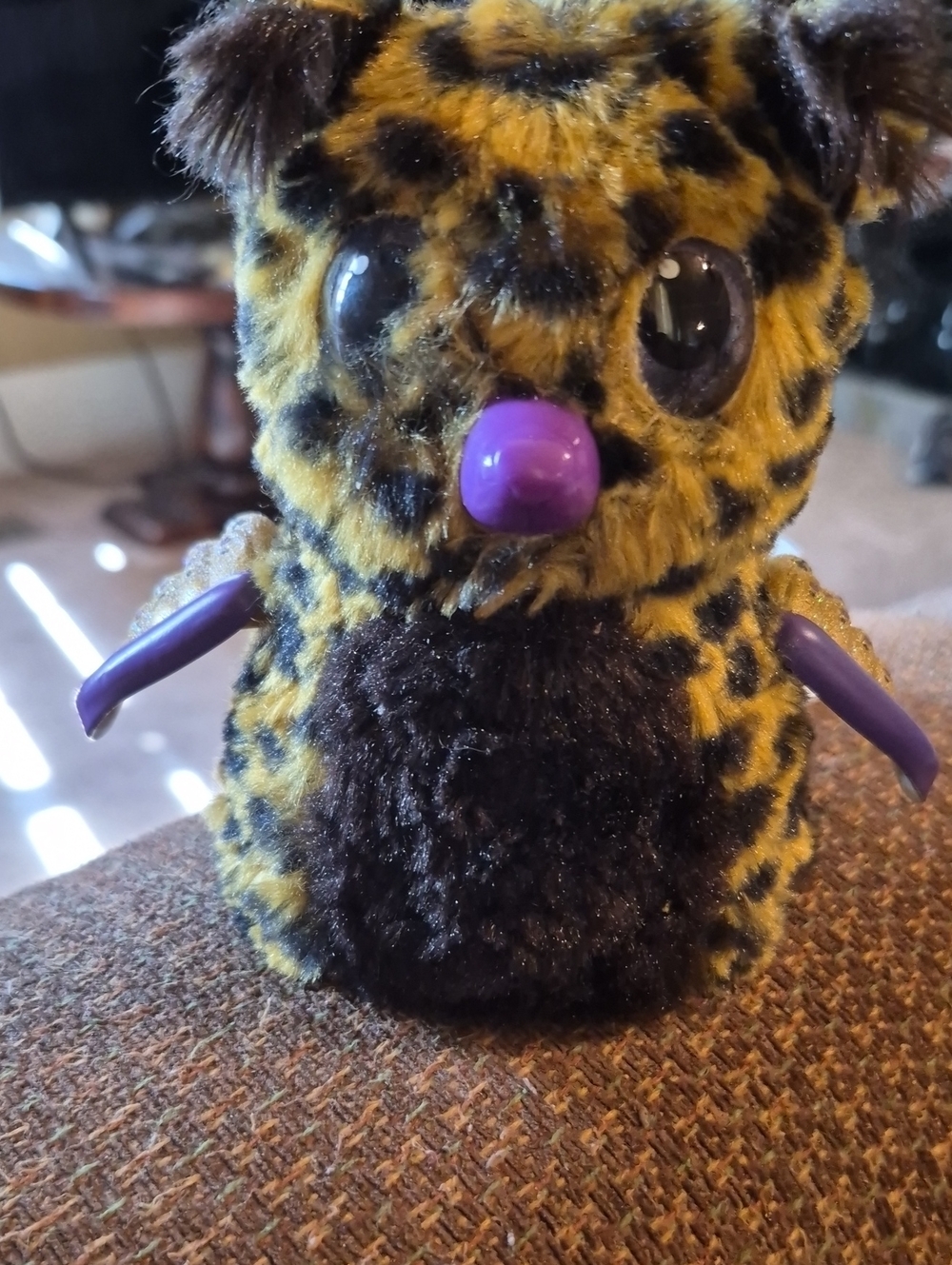 Plush Leopard-Print Cuddly Toy with Purple Accents